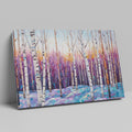 Framed canvas print of a vibrant geometric mosaic depicting an abstract birch forest with coloured leaves and sunset backdrop