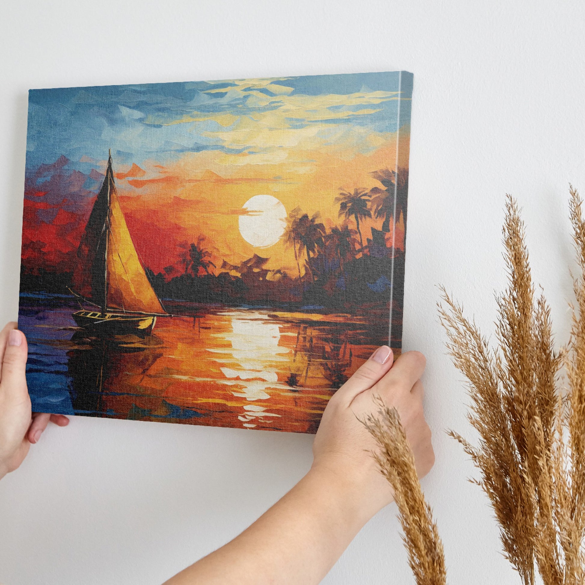 Framed canvas print of an Impressionist sailboat sailing at sunset with vibrant orange and blue colors