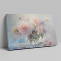 Framed canvas print of delicate dahlias in a glass vase with a soft pastel palette