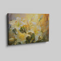 Framed canvas print of impressionist lilies in warm shades of yellow and cream