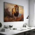 Framed canvas print of a realistic lion amidst a warm-toned African savannah landscape