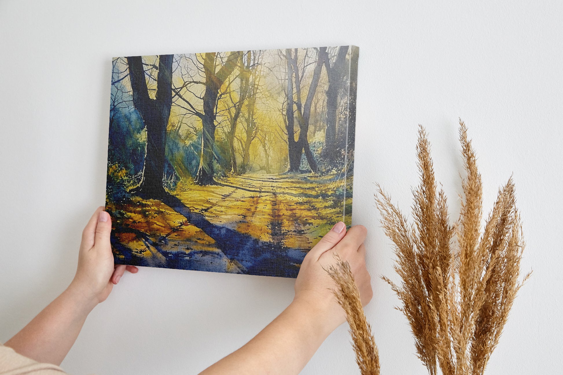 Framed canvas print of a sunlit path through a misty forest in watercolour with vibrant yellow and cool blue tones