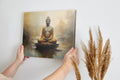 Framed canvas print of a serene Golden Buddha statue with abstract background