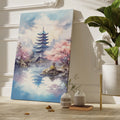 Framed canvas print of a traditional pagoda with cherry blossoms over tranquil waters, with modern skyline in the background