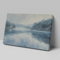 Framed canvas print of a serene lakeside watercolor painting with soft blue and grey tones