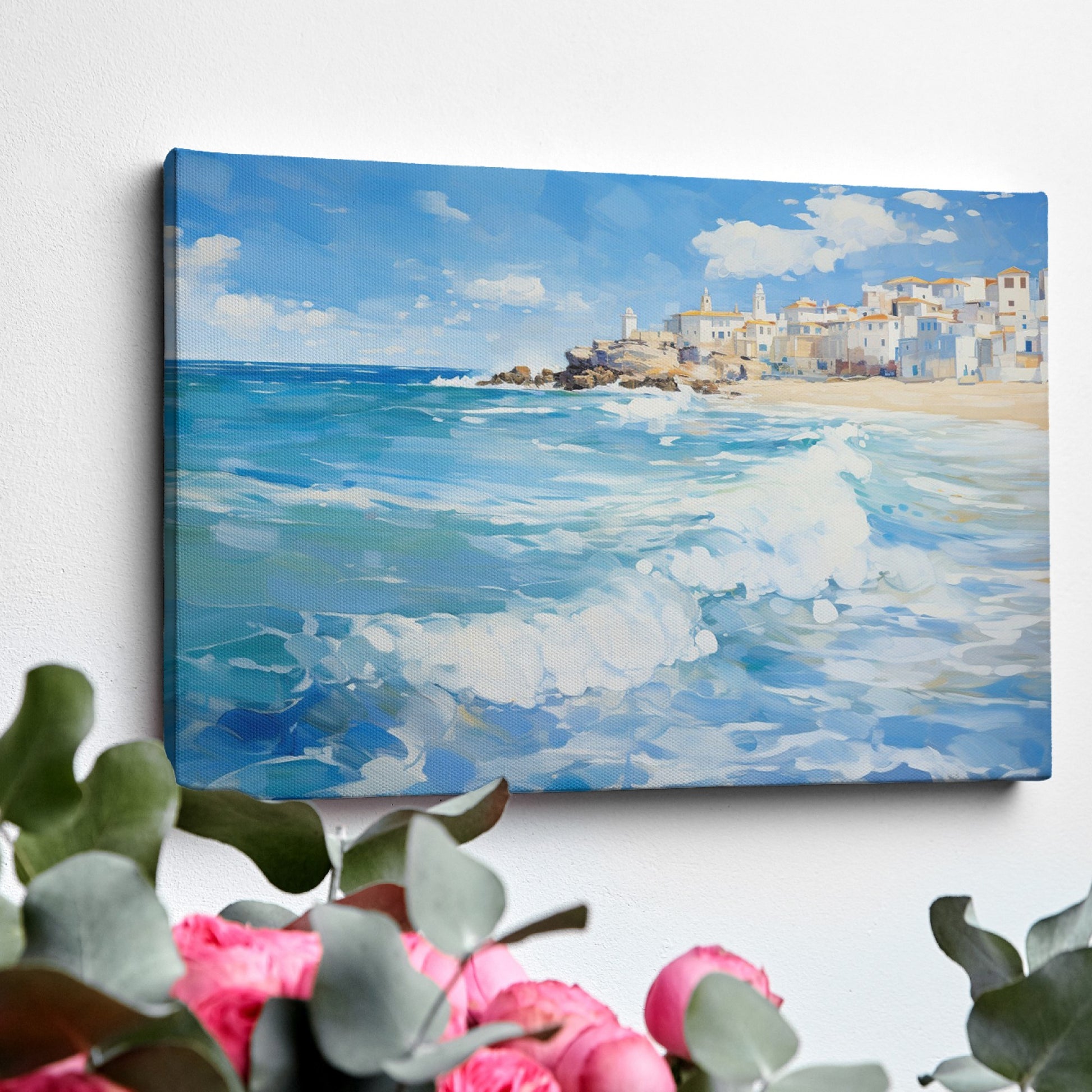 Framed canvas print of a Mediterranean village by the sea with vibrant blue waves and sunny sky