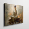 Framed canvas print of a meditative woman in peaceful surroundings with warm, autumnal colors