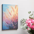 Framed canvas print of abstract pampas grass in sunset colours against a blue sky