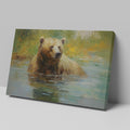 Framed canvas print of an impressionistic painting of a brown bear in a tranquil river setting with lush greenery