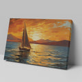 Framed canvas print of a sailboat against a vivid sunset with warm orange and blue tones