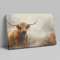 Framed canvas print of a majestic Highland Cow in a foggy autumnal landscape with warm earthy tones