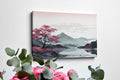 Framed canvas print of an oriental cherry blossom beside a reflective lake with mountain backdrop