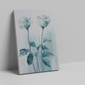 Framed canvas print of abstract blue roses with a textured appearance and soft colour palette