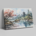 Framed canvas print of a traditional Asian pagoda by a lake with autumn cherry blossoms