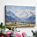 Framed canvas print of an impressionist painting featuring a snowy mountain landscape with an alpine village