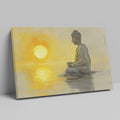 Framed canvas print of a meditative figure with the sun setting over water, reflecting golden tones