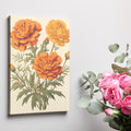 Framed canvas print of vintage illustrated marigold flowers in warm orange tones