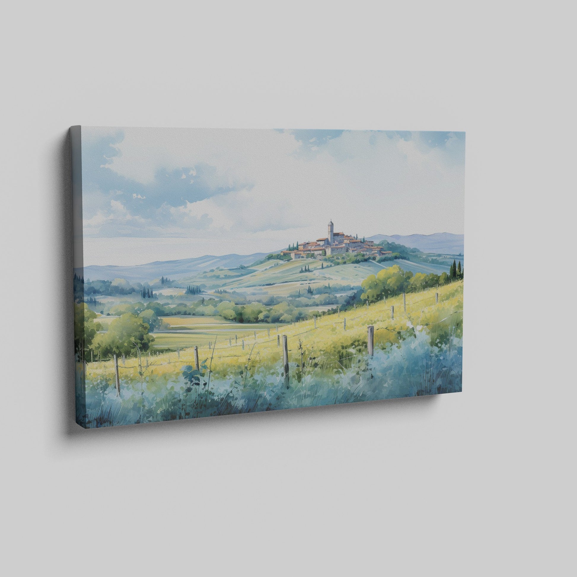 Framed canvas print of a Tuscan landscape with watercolor rolling hills and a village