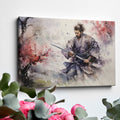 Framed canvas print of a samurai warrior in watercolour, with dynamic ink splatters in vivid hues.