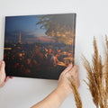 Framed canvas print of a romantic rooftop dining scene in Paris with Eiffel Tower in the background