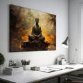 Framed canvas print of a meditative Buddha in a serene forest setting with warm, fiery orange hues