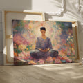 Framed canvas print of a meditative figure in a floral garden with soft pastel tones