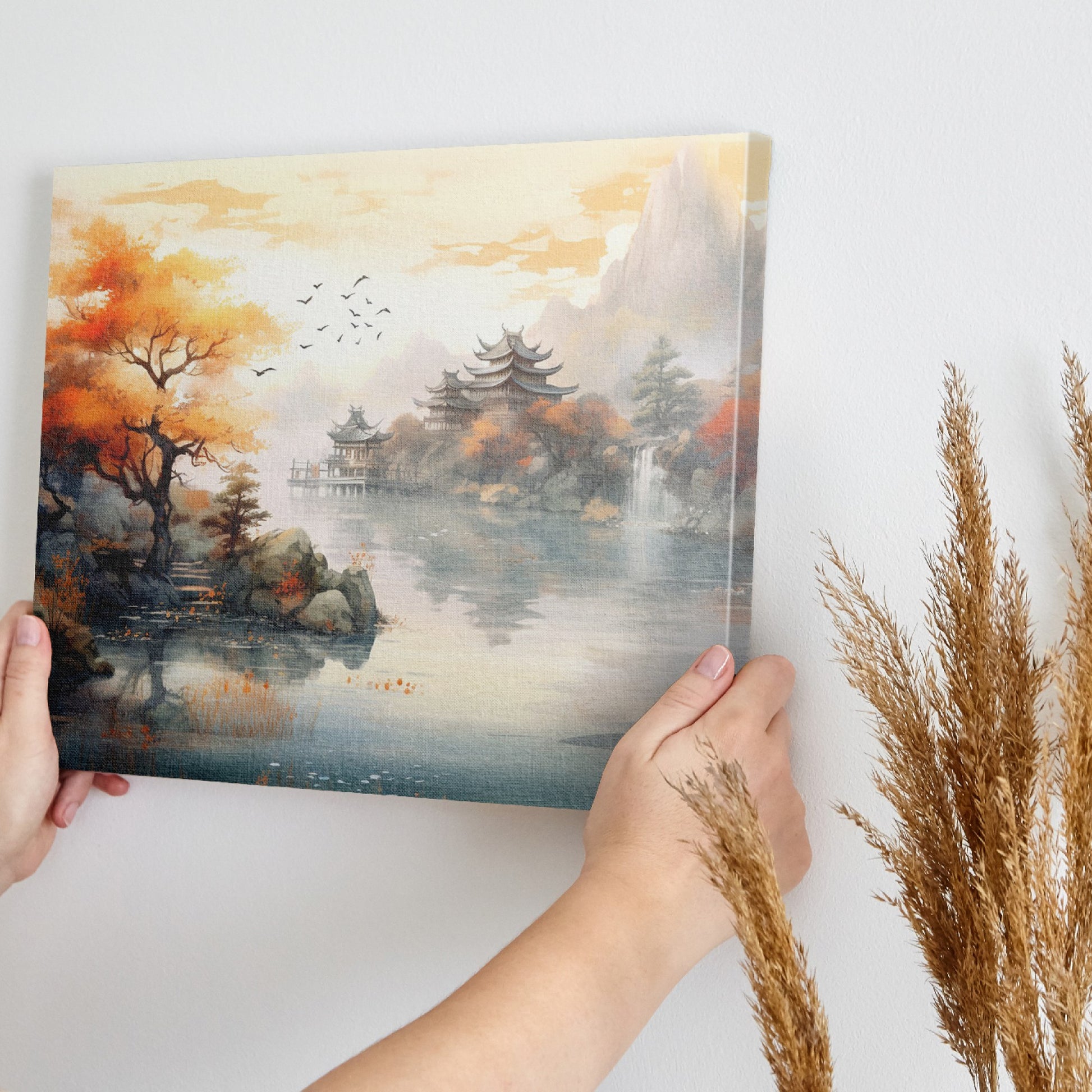 Framed canvas print of an Asian-inspired scene featuring traditional Chinese pagodas amid autumnal trees by a misty lake with a waterfall