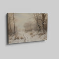 Framed canvas print of a tranquil winter landscape with snow-covered trees and a snowy path