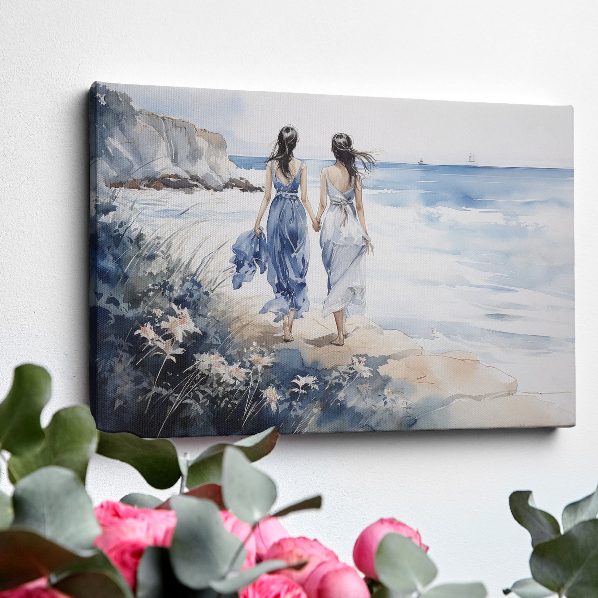 Watercolor painting of two women in blue and white dresses walking along a seaside cliff with a calm ocean backdrop