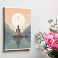 Framed canvas print of meditative figure in front of tranquil mountains and reflective water at sunset