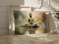 Framed canvas print of a serene Buddha sitting in meditation with a reflective water effect