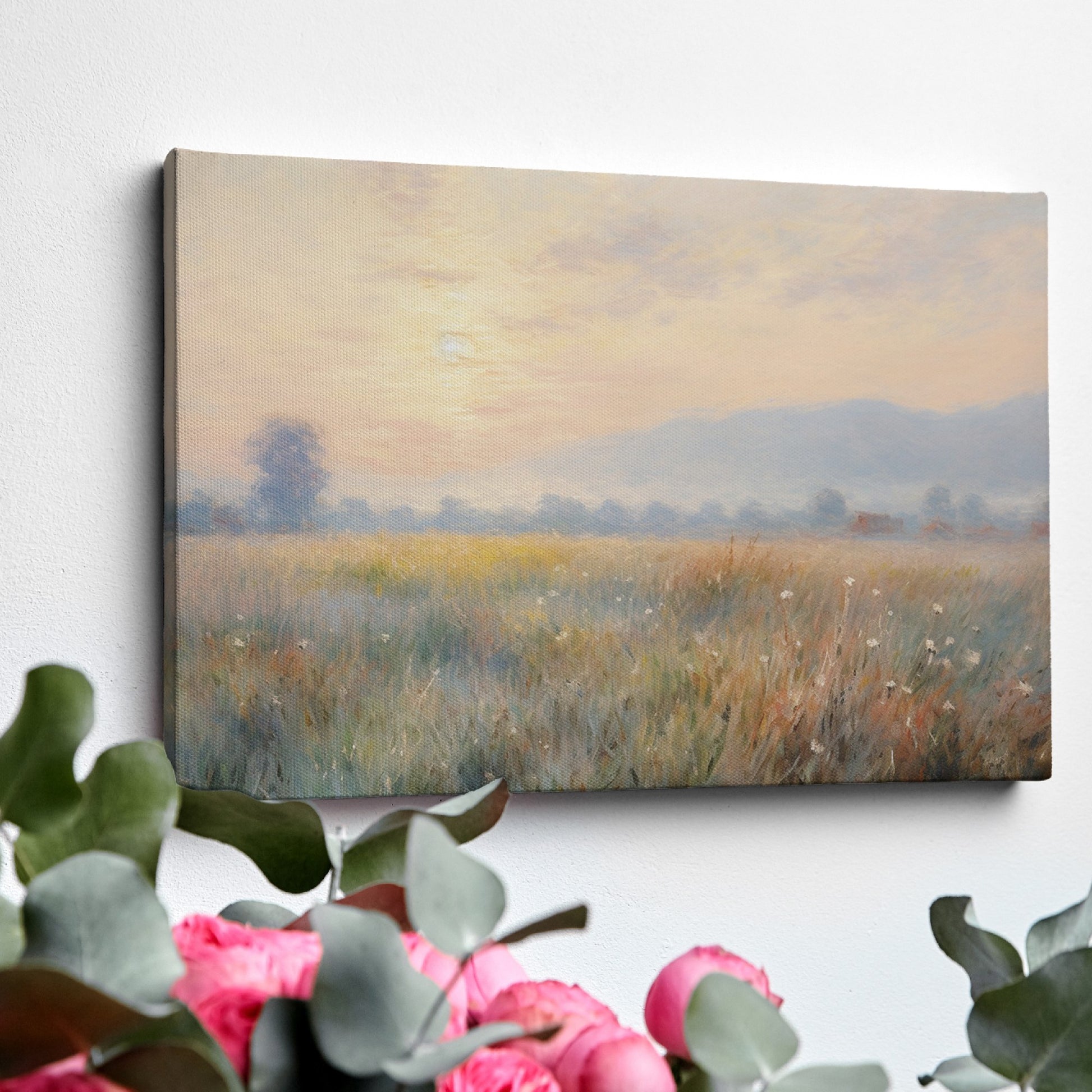 Framed canvas print of an impressionist painting with a sunrise over a tranquil countryside landscape