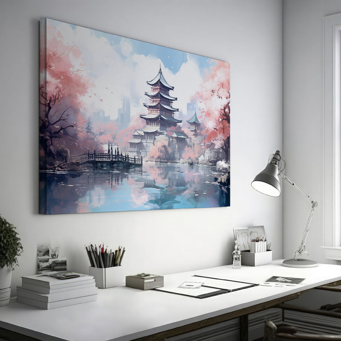 Framed canvas print of a Japanese pagoda surrounded by cherry blossoms and reflected in a tranquil pond