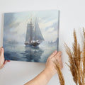 Framed canvas print of an impressionistic painting of a sailboat in a misty seascape setting