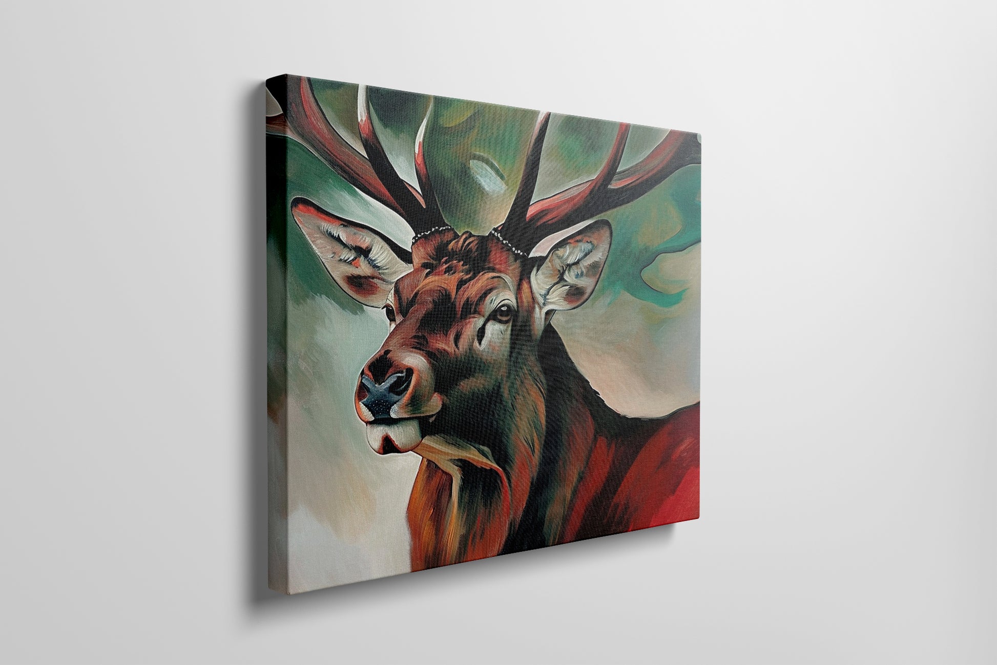 Framed canvas print of an expressive stag portrait with vibrant reds and abstract green background