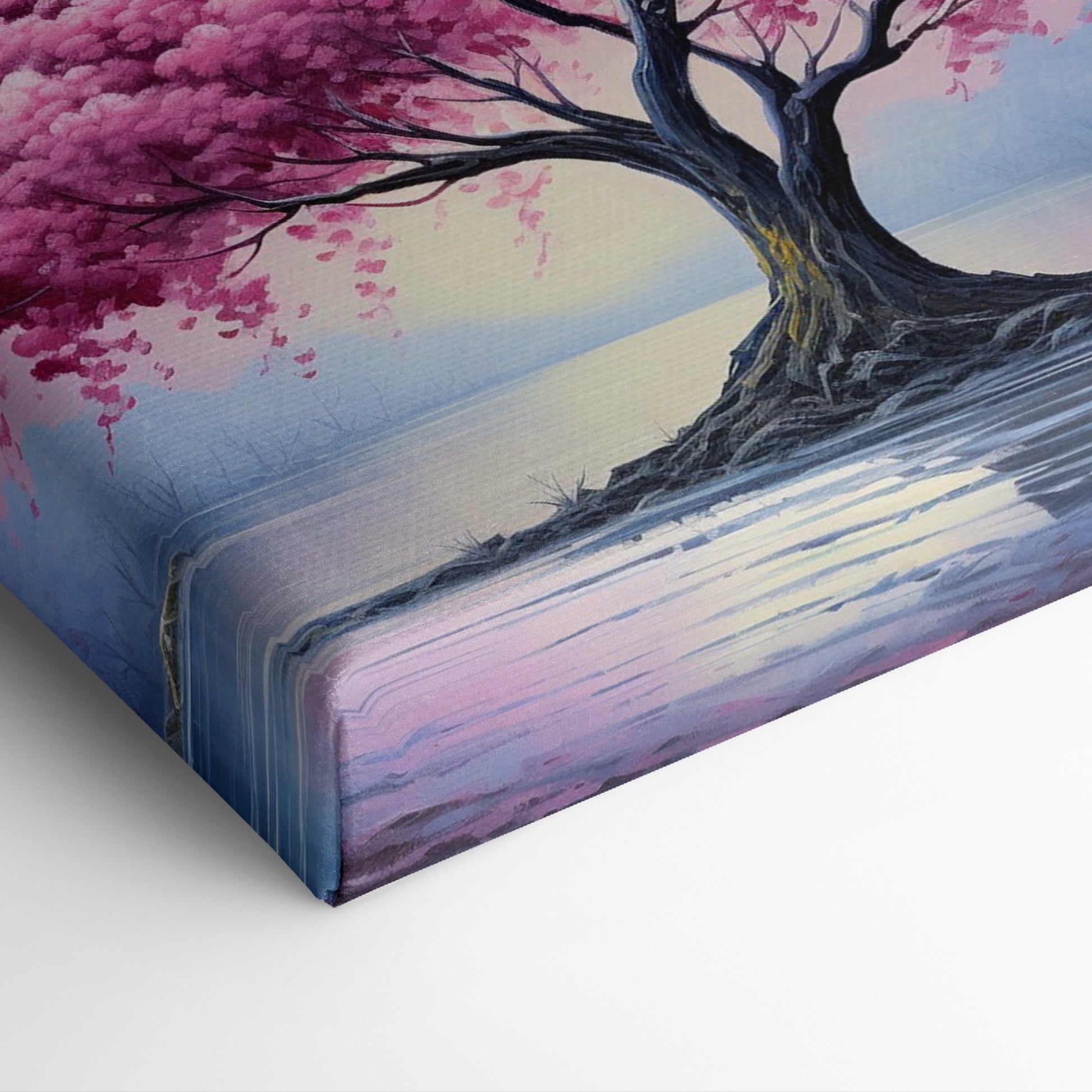 Framed canvas print of a blossoming cherry tree by the water with sunset reflection