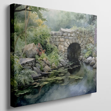 Framed canvas print of a serene watercolor painting of a rustic stone bridge over a calm pond with water lilies