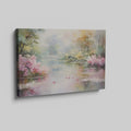 Framed canvas print of a serene impressionistic painting featuring a lake, azalea blooms, and a reflection of trees