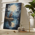 Framed canvas print of an owl perched beside a reflective lake under a full moon night sky