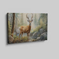 Framed canvas print of realistic deer in a forest with a stream and rocks