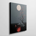 Framed canvas print of a minimalist tree at night with a glowing moon and red leaf accents