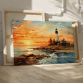 Framed canvas print of a lighthouse overlooking the ocean at sunset with vibrant sky and calm water reflections