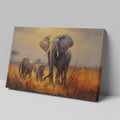 Framed canvas print of a family of elephants in a vibrant, golden savannah sunset