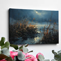 Framed canvas print of an impressionistic landscape with moonlit waters and reed-filled foreground